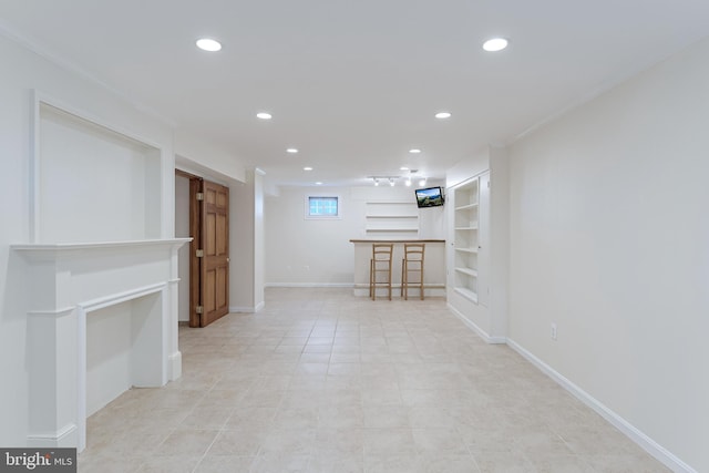 142 N French St, Alexandria, VA 22304 - below grade area with built in features, recessed lighting, baseboards, and bar area