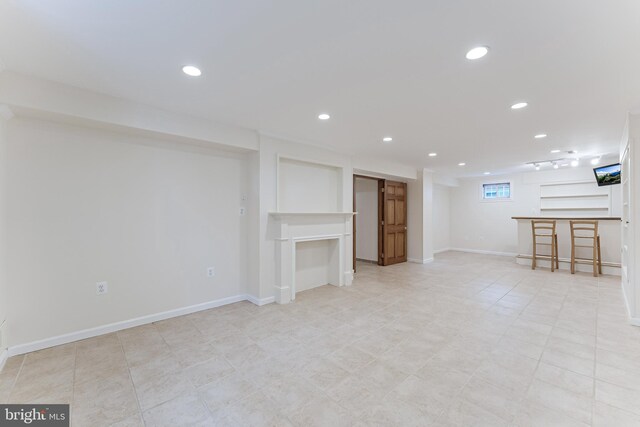 142 N French St, Alexandria, VA 22304 - basement featuring recessed lighting, bar area, and baseboards