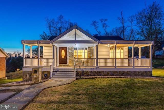 142 N French St, Alexandria, VA 22304 - view of front of home with covered porch and a front yard