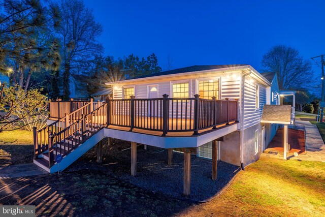 142 N French St, Alexandria, VA 22304 - back of house at twilight featuring a deck and stairway
