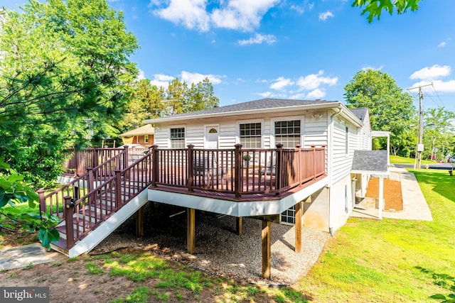 142 N French St, Alexandria, VA 22304 - rear view of property featuring a deck and a yard