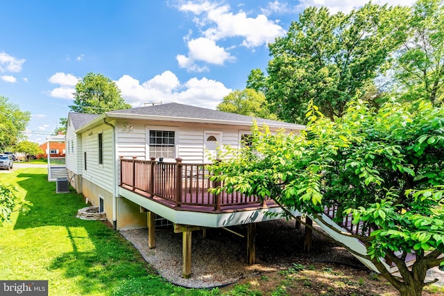142 N French St, Alexandria, VA 22304 - rear view of property featuring a deck, a yard, and a shingled roof