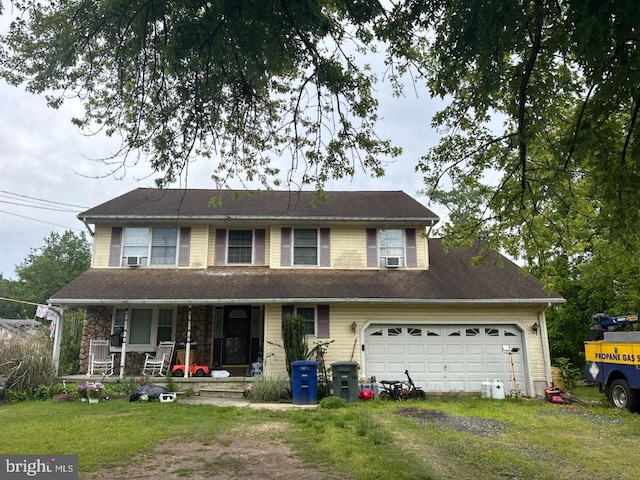 view of front of home featuring dirt driveway, a porch, a front yard, an attached garage, and cooling unit