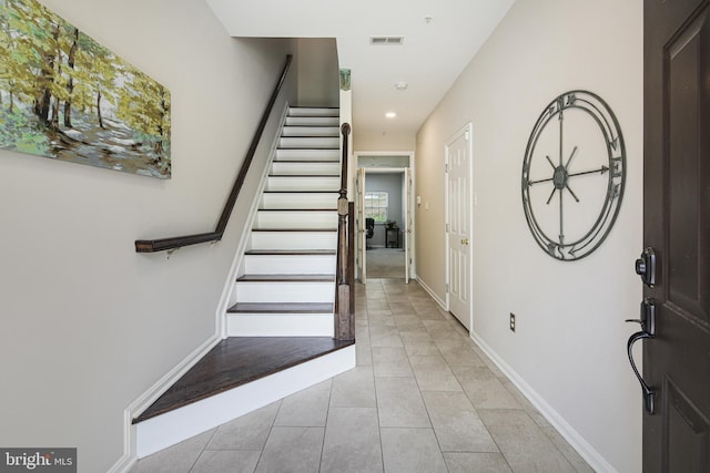 6129 White Marble Ct, Clarksville, MD 21029 - foyer entrance with stairs, light tile patterned flooring, baseboards, visible vents, and recessed lighting