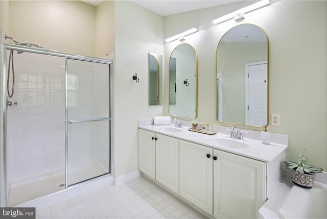6129 White Marble Ct, Clarksville, MD 21029 - full bathroom featuring a tile shower, tile patterned floors, a sink, and double vanity