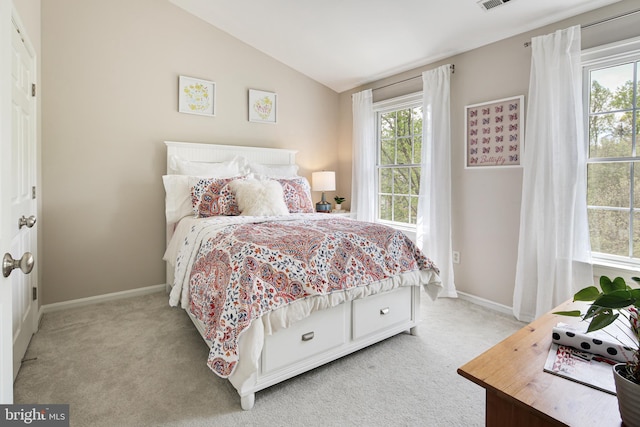 6129 White Marble Ct, Clarksville, MD 21029 - bedroom featuring baseboards, vaulted ceiling, and light colored carpet