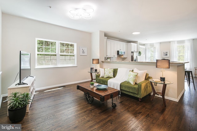 6129 White Marble Ct, Clarksville, MD 21029 - living room with baseboards and dark wood-style flooring