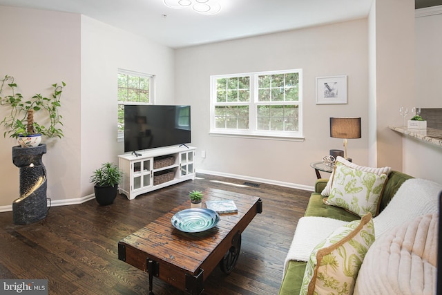 6129 White Marble Ct, Clarksville, MD 21029 - living room with wood finished floors, visible vents, and baseboards
