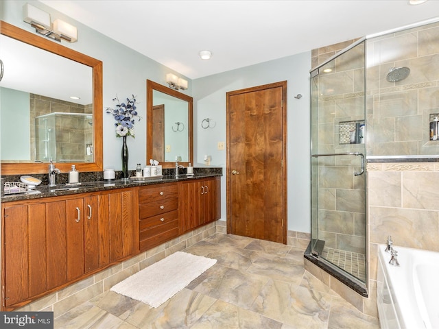 10334 Harp Rd, Walkersville, MD 21793 - full bathroom with a sink, double vanity, a stall shower, recessed lighting, and a garden tub