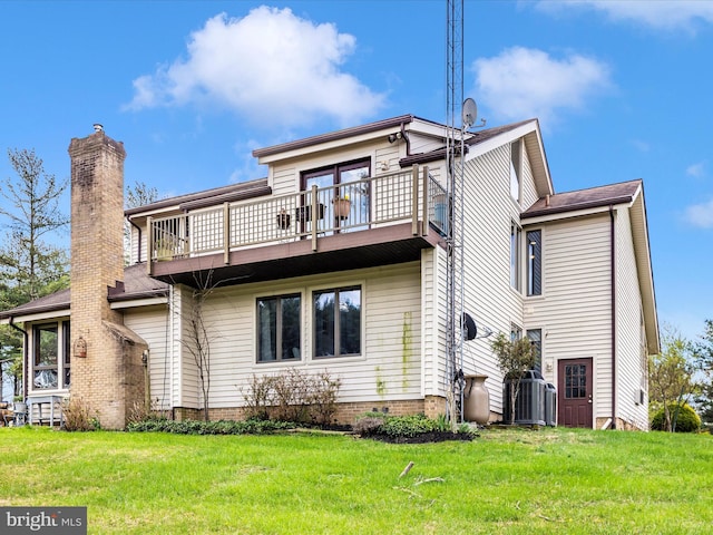 10334 Harp Rd, Walkersville, MD 21793 - back of property featuring central air condition unit, a lawn, and a balcony