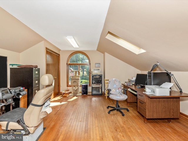 10334 Harp Rd, Walkersville, MD 21793 - home office with light wood-style floors and vaulted ceiling with skylight