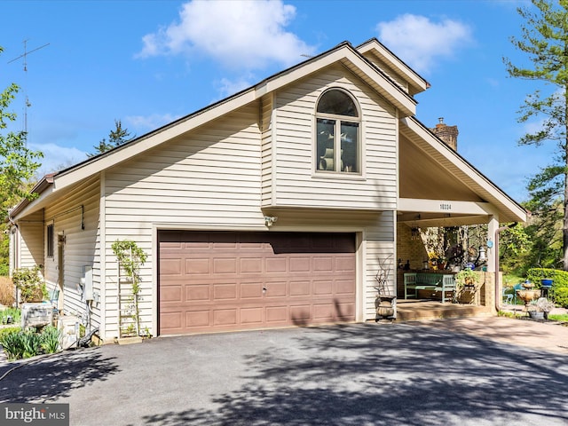 10334 Harp Rd, Walkersville, MD 21793 - view of property exterior featuring a chimney and aphalt driveway
