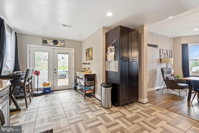 2205 Elsinore Ave, Baltimore, MD 21216 - kitchen featuring baseboards, french doors, dark brown cabinets, and recessed lighting