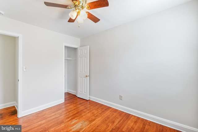 4720 Kimberleigh Rd, Baltimore, MD 21212 - unfurnished bedroom featuring light wood-style flooring, a closet, and baseboards