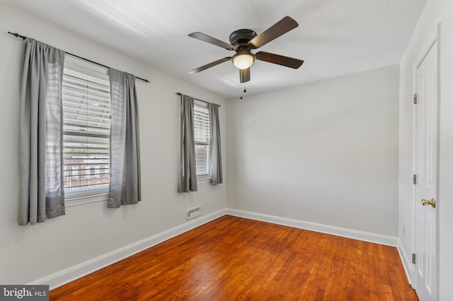4720 Kimberleigh Rd, Baltimore, MD 21212 - spare room with baseboards, a ceiling fan, and wood finished floors