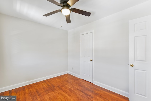 4720 Kimberleigh Rd, Baltimore, MD 21212 - unfurnished bedroom featuring baseboards, ceiling fan, and wood finished floors