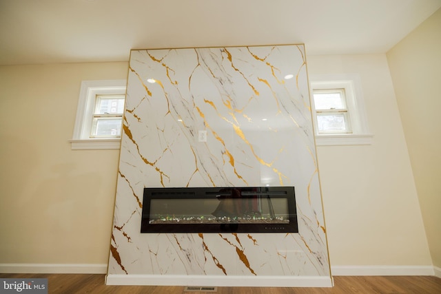 5315 Kenilworth Ave, Baltimore, MD 21212 - details with wood finished floors, visible vents, and baseboards