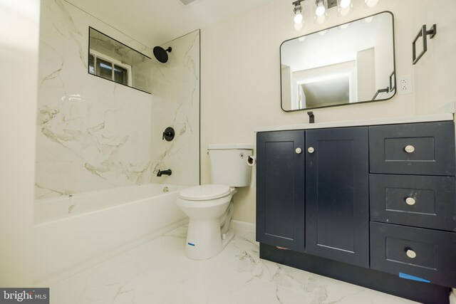 5315 Kenilworth Ave, Baltimore, MD 21212 - bathroom featuring marble finish floor, toilet, vanity, baseboards, and shower / bathing tub combination