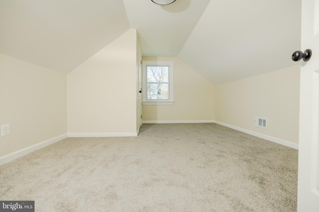 5315 Kenilworth Ave, Baltimore, MD 21212 - bonus room featuring baseboards, vaulted ceiling, and carpet flooring