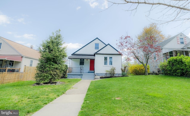 5315 Kenilworth Ave, Baltimore, MD 21212 - bungalow-style house featuring a porch, a front lawn, and fence
