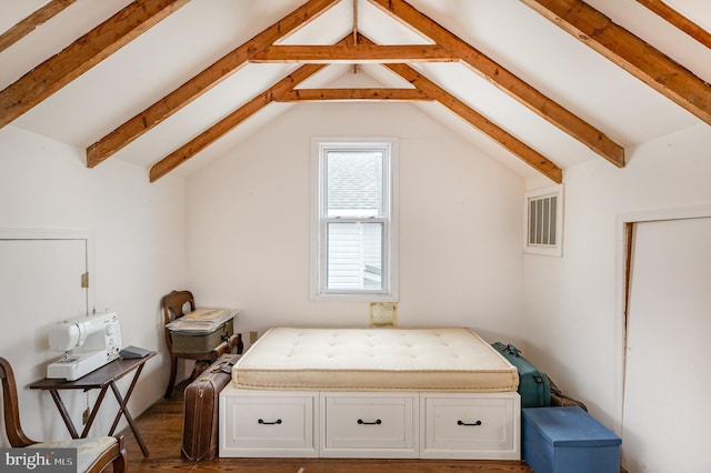 bedroom with vaulted ceiling with beams and visible vents