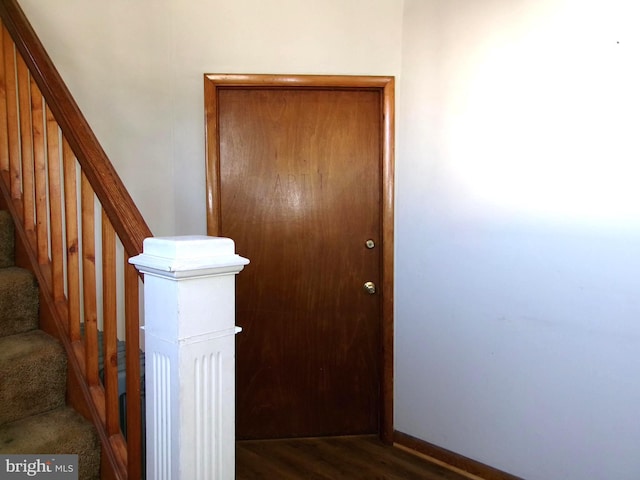 4204 Kenwood Ave, Baltimore, MD 21206 - staircase with baseboards and wood finished floors