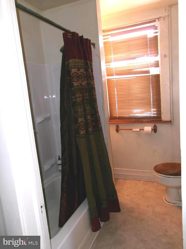 4204 Kenwood Ave, Baltimore, MD 21206 - bathroom with shower / bath combination with curtain, toilet, and baseboards