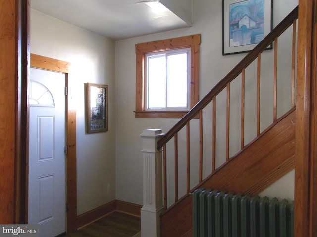 4204 Kenwood Ave, Baltimore, MD 21206 - foyer featuring radiator heating unit, baseboards, stairs, and wood finished floors