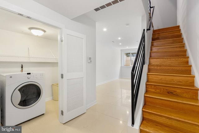 laundry area featuring washer / clothes dryer, recessed lighting, light tile patterned flooring, and visible vents