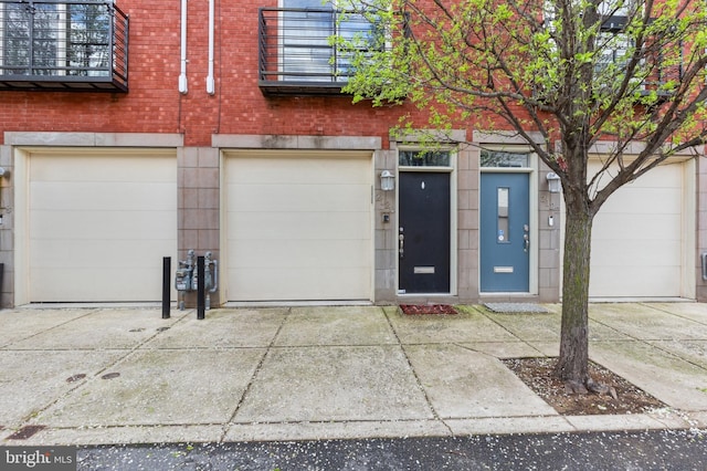 garage featuring driveway