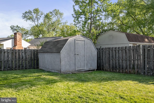 view of shed featuring a fenced backyard
