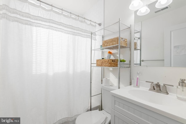 1256 S 27th St, Philadelphia, PA 19146 - full bath with visible vents, toilet, and vanity