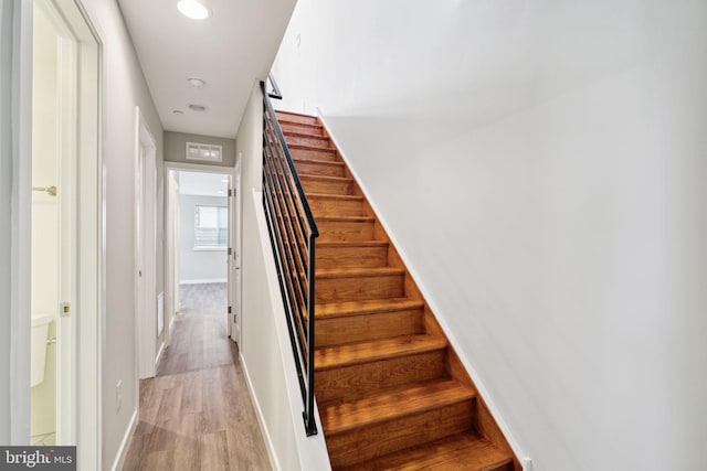 1256 S 27th St, Philadelphia, PA 19146 - stairs featuring baseboards, recessed lighting, and wood finished floors