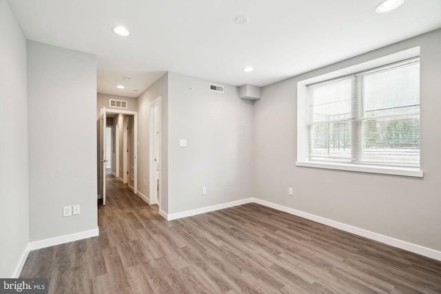 1256 S 27th St, Philadelphia, PA 19146 - empty room featuring visible vents, baseboards, recessed lighting, and wood finished floors