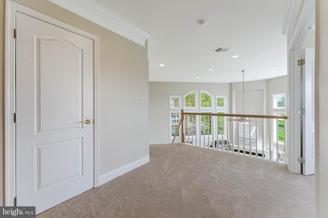 hallway with baseboards, visible vents, recessed lighting, and carpet flooring