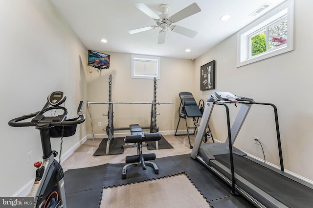 exercise room featuring baseboards, visible vents, plenty of natural light, and recessed lighting