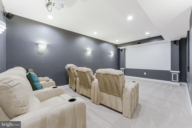 home theater featuring recessed lighting, light carpet, and baseboards