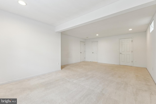unfurnished room featuring light colored carpet and recessed lighting