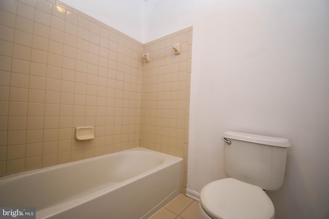 full bath with toilet and tile patterned flooring