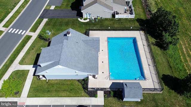 drone / aerial view of a pool area