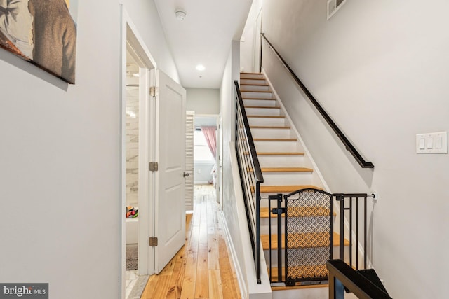 2512 Collins St, Philadelphia, PA 19125 - stairway featuring recessed lighting, baseboards, visible vents, and hardwood / wood-style flooring