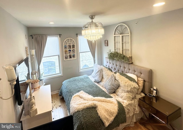 2512 Collins St, Philadelphia, PA 19125 - bedroom with baseboards, a notable chandelier, wood finished floors, and recessed lighting