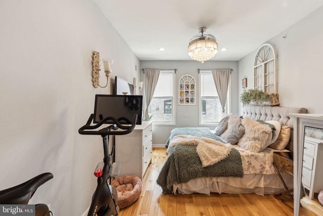 2512 Collins St, Philadelphia, PA 19125 - bedroom with a notable chandelier, wood finished floors, and recessed lighting
