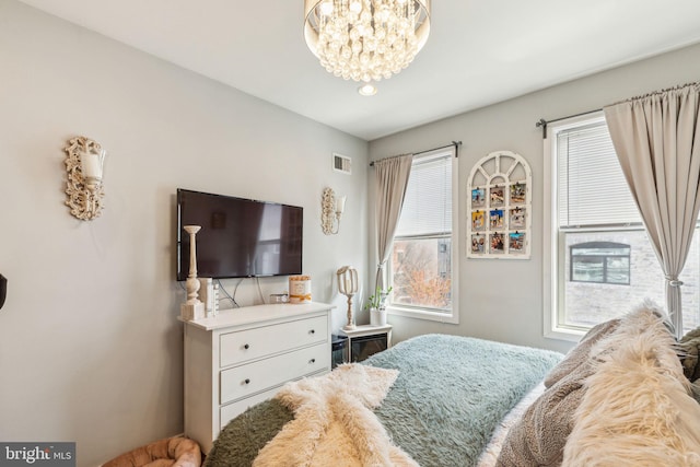 2512 Collins St, Philadelphia, PA 19125 - bedroom with a notable chandelier and visible vents