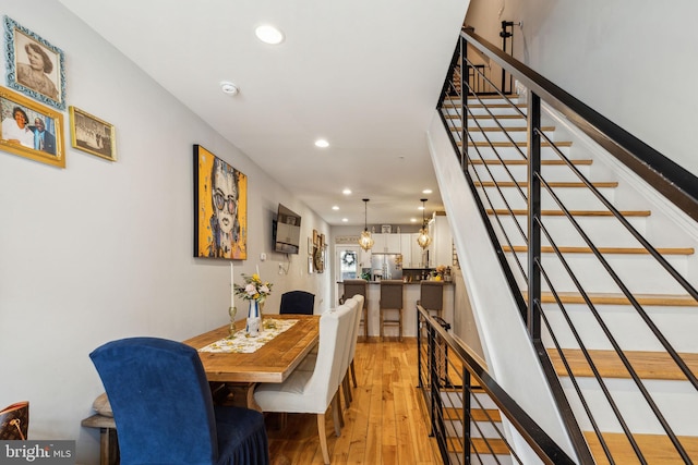2512 Collins St, Philadelphia, PA 19125 - dining space featuring light wood-type flooring, recessed lighting, and stairs