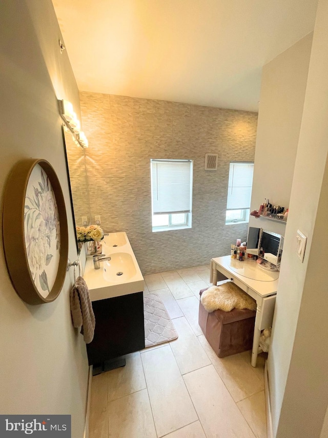 2512 Collins St, Philadelphia, PA 19125 - full bathroom featuring double vanity, tile patterned flooring, and a sink