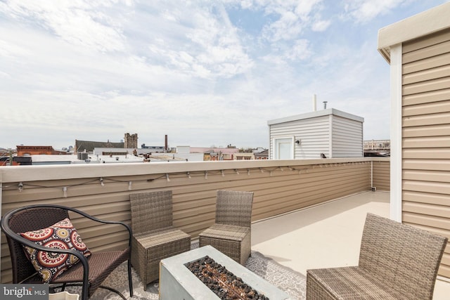 2512 Collins St, Philadelphia, PA 19125 - view of patio / terrace with an outdoor fire pit and a balcony