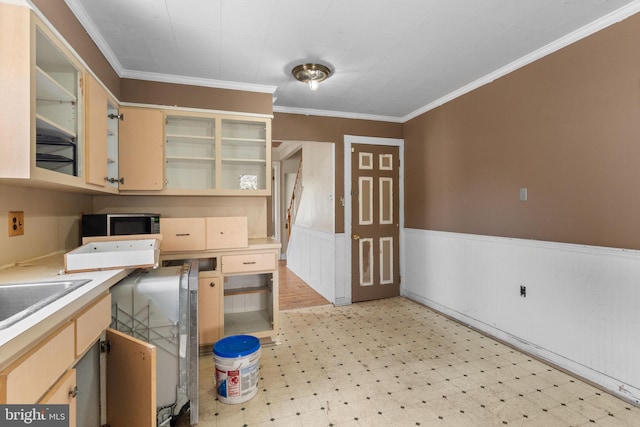 702 Chestnut St, Delanco, NJ 08075 - kitchen with light floors, stainless steel microwave, open shelves, ornamental molding, and a wainscoted wall
