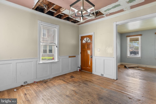 702 Chestnut St, Delanco, NJ 08075 - interior space featuring an inviting chandelier, hardwood / wood-style flooring, crown molding, and wainscoting