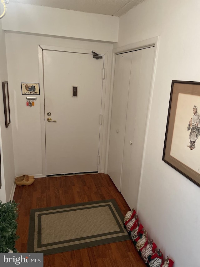 27210 Valley Run Dr Unit 210, Wilmington, DE 19810 - doorway to outside with wood finished floors